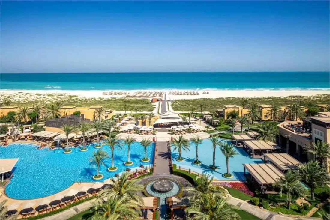 Pools and palms at a five-star beach resort on Saadiyat Island