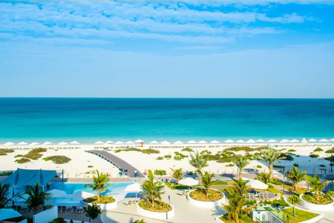 Saadiyat's white sand beach and turquoise water seen from above