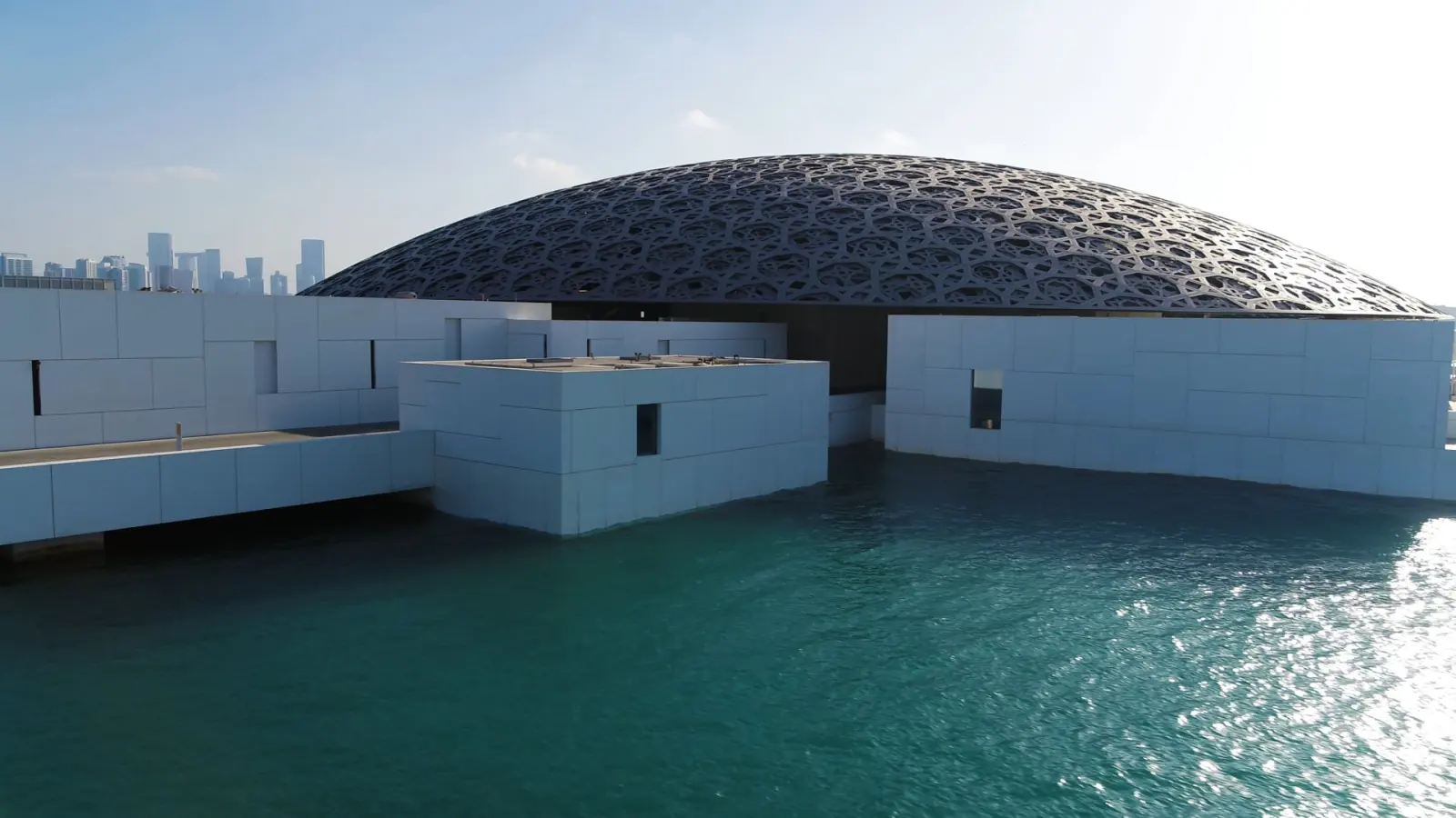 Aerial still over Louvre Abu Dhabi and the Saadiyat coastline